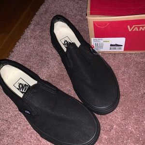 black slip on vans .